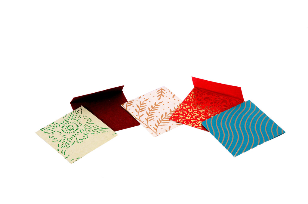 Handmade, pack of colorful square envelopes in different handmade sheets.