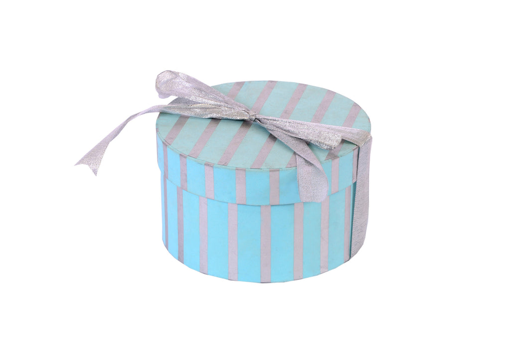 Handcrafted, tall and round box made with blue handmade paper.