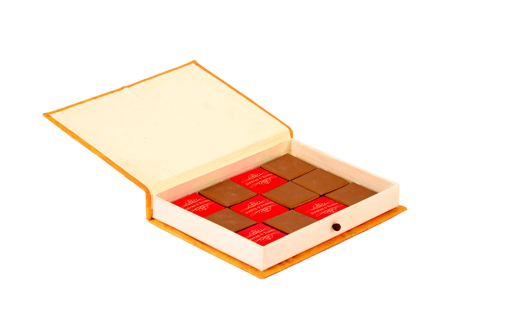 Handcrafted, rectangular chocolate box, attached lid, elastic lock