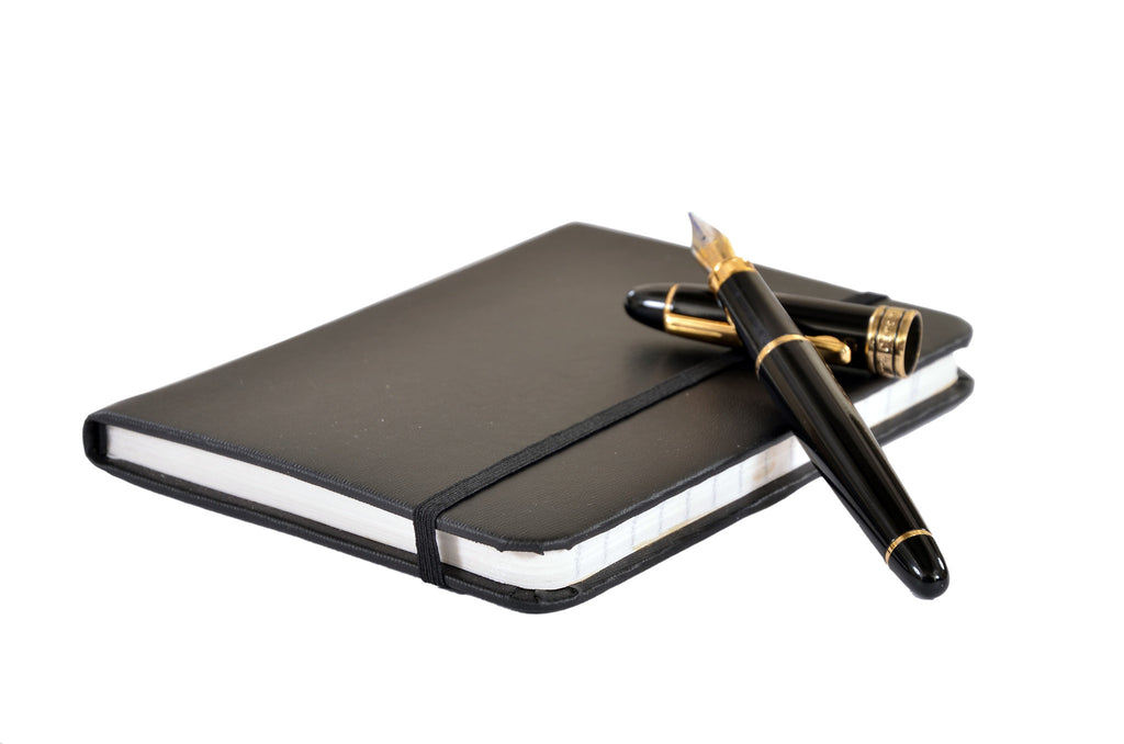 Handmade diary covered with black Rexene