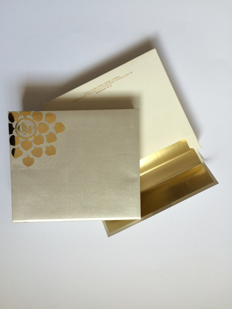 Handmade wedding card, made in gold and cream paper