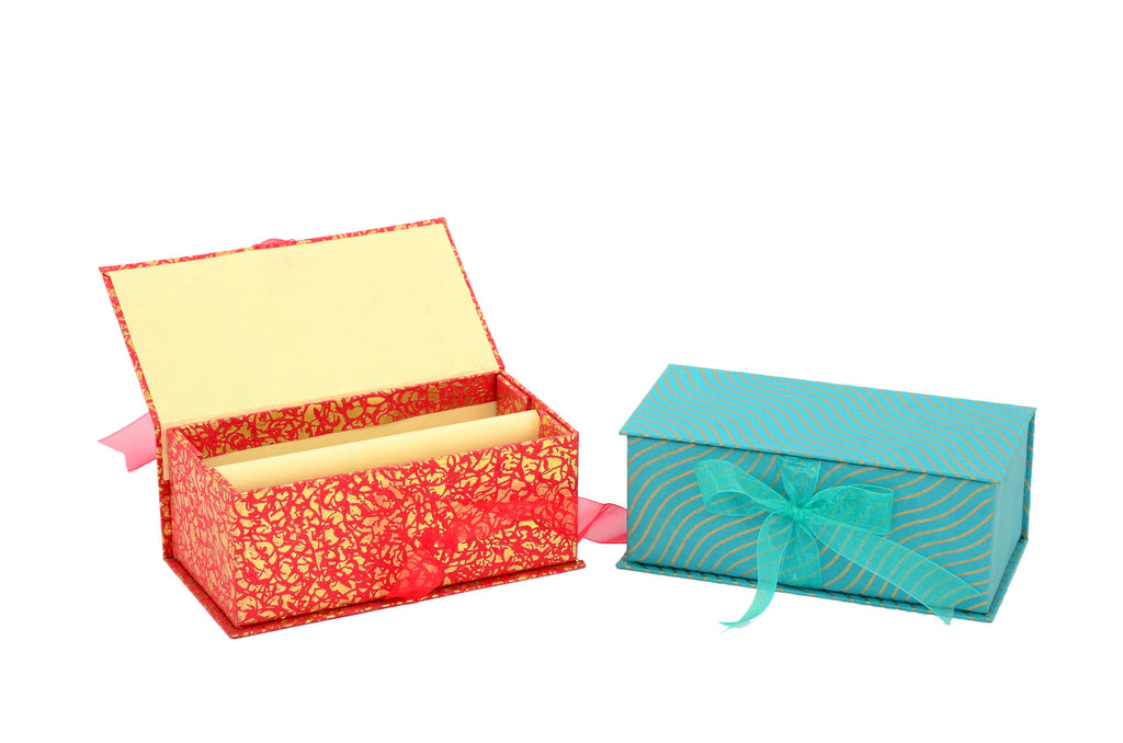 Handcrafted bangle box in cardboard and handmade sheet with removable bar