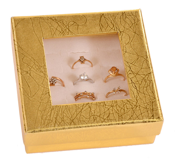 Handcrafted, ring boxes made with bright sheets with luster to cover.