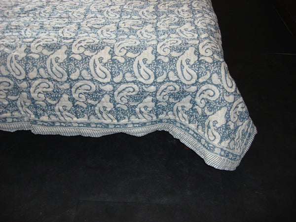 Handmade, cotton, block printed quilt with paisleys in indigo blue