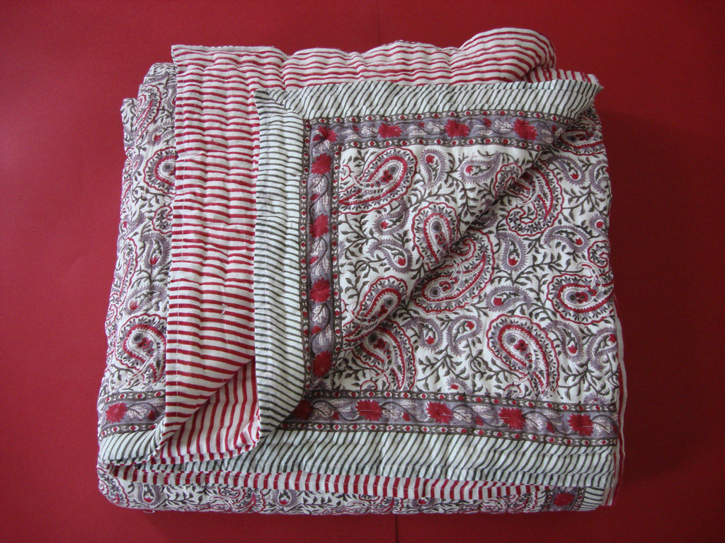 Handmade, reversible, cotton, block printed quilt, combination of paisleys and stripes in crimson red.
