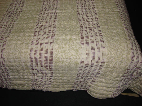 Handmade, reversible, cotton, block printed designer quilt, shades of green and reddish brown.