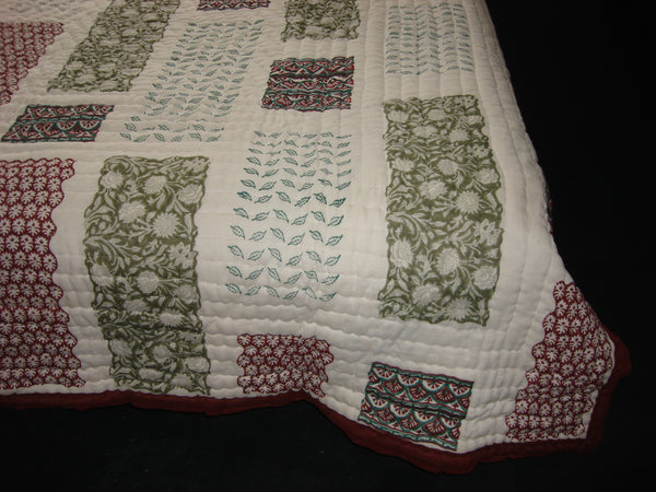 Handmade quilt, reversible, cotton, block printed in patchwork style, combination of different blocks