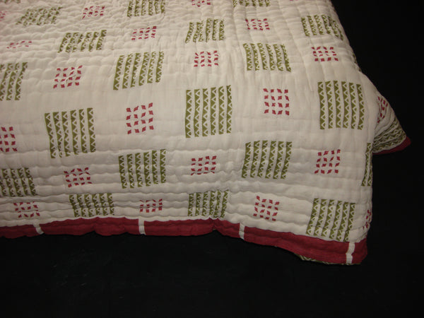 Handmade quilt, reversible, cotton, block printed blending ethic and traditional design.
