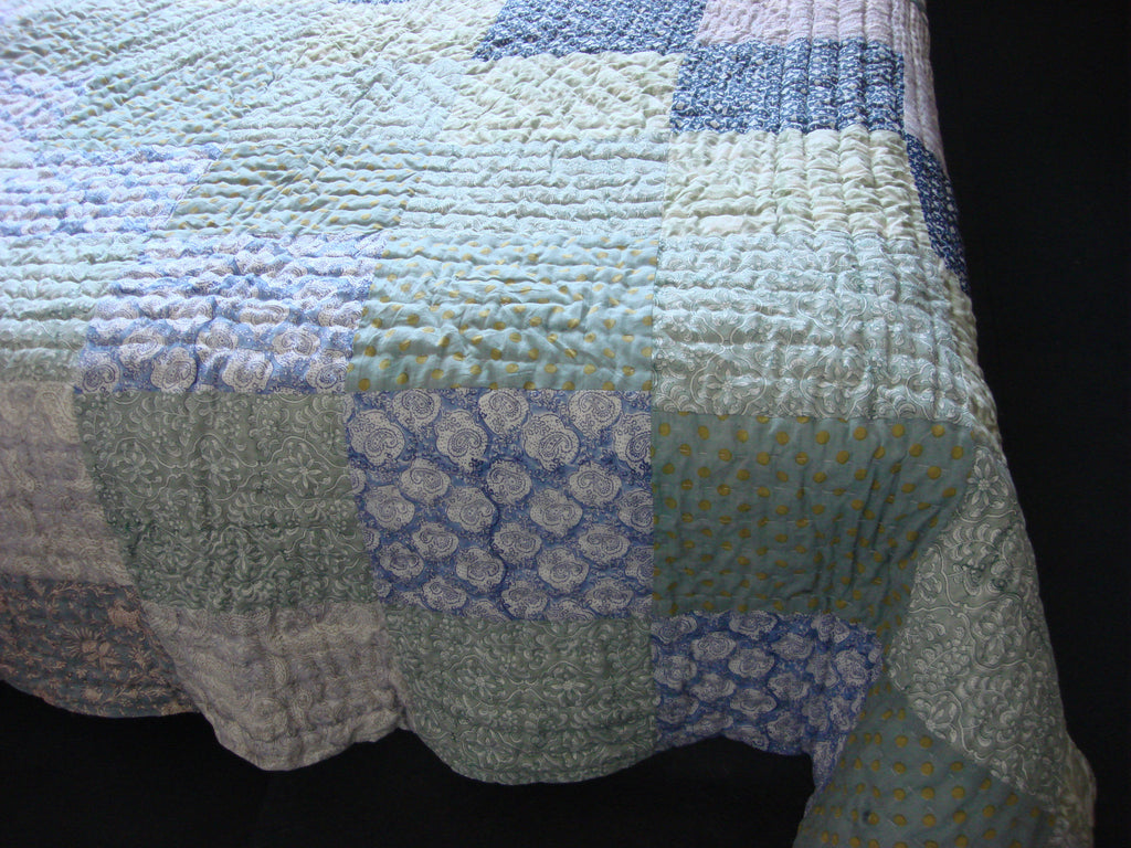 Handmade, patchwork cotton quilt in block prints in grey and blue